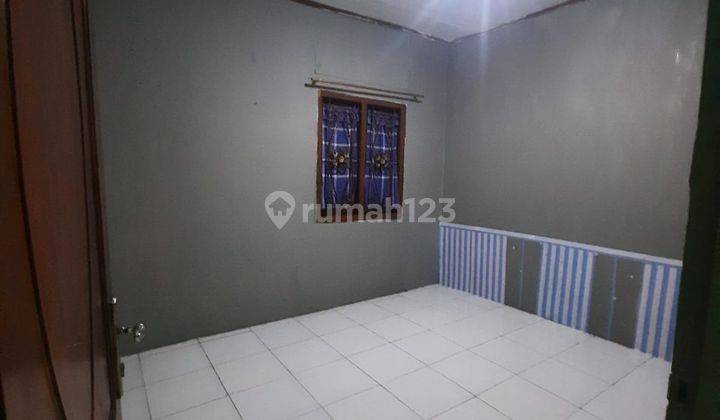 Rumah Pinggir Jalan Besar di Karangsatria Bekasi  2