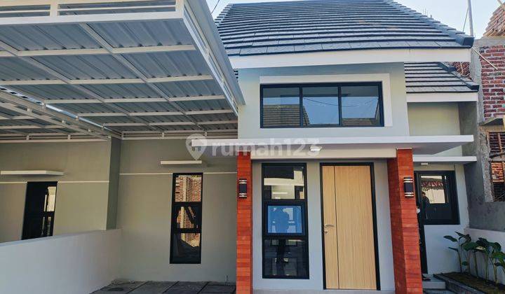 Dijual Rumah Desain Modern Dalam Cluster Include Kanopi 1