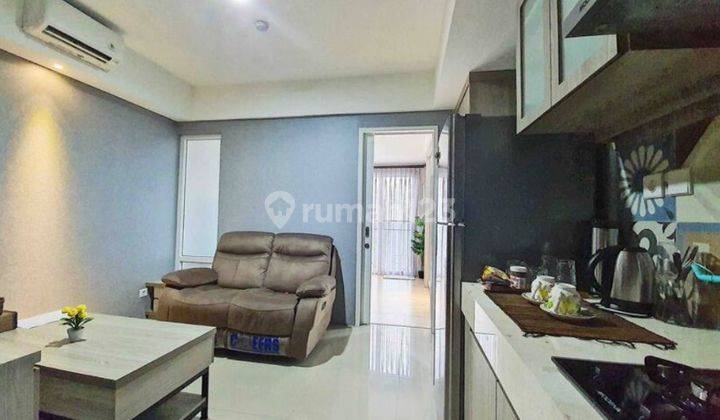 ruang keluarga apartemen breeze bintaro 1 br