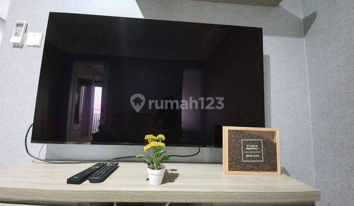 ruang keluarga apartemen breeze bintaro 1 br