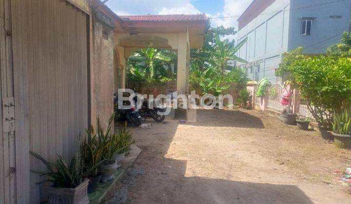 Rumah Bulatan Di Jl Inpres 2