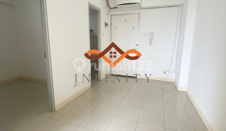 Sewa Apartemen Green Bay Pluit Tipe 2 Kamar Unfurnished View ke Kota + 2 AC