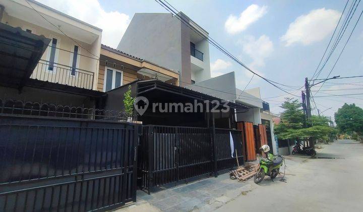 Rumah 2 Lt Shm Di Karang Tengah Permai  2