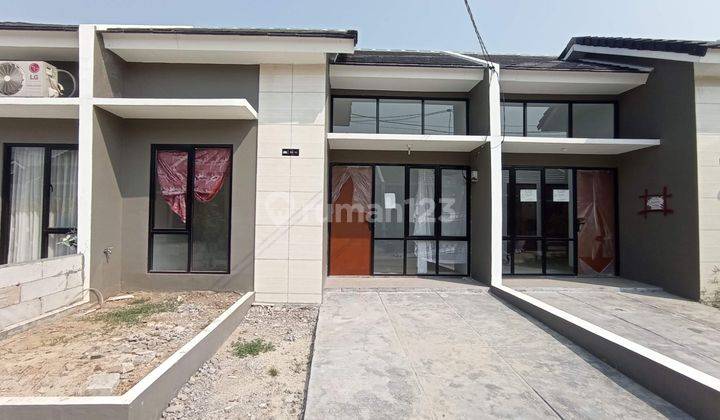 Rumah Over Kredit Griya Artha Sukasari Residence Cluster Kuta 1