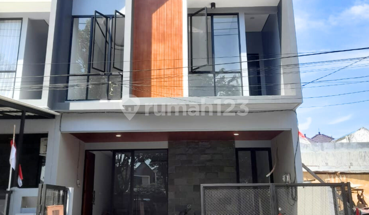 Manyar2-an Exclusive Rumah Modern Baru Lokasi strategis 