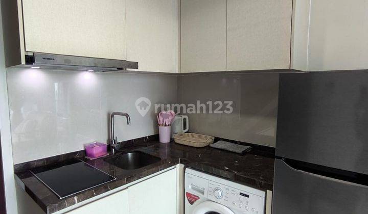 Apartemen Puri Mansion 2 BR Luas 49m² Fully Furnished 1