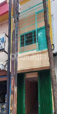 Strategic 3-Story Shop House Ready for Business - 76M² Land Certificate, Busy Street 1