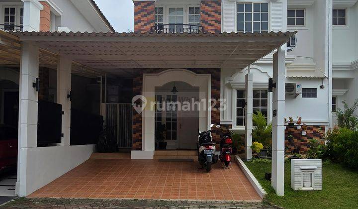 Rumah Hunian dengan taman belakang di The Green 1