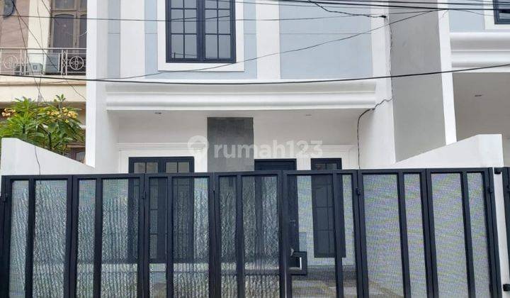 Rumah Baru siap huni Manyar Indah American Minimalis 1