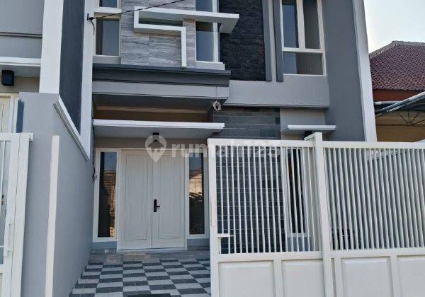 Rumah di Tenggilis Model Scandinavian Strategis 1