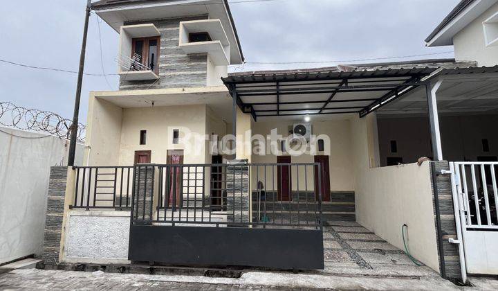 RUMAH CLUSTER 1 LANTAI SEMI FURNISHED COLOMADU 1