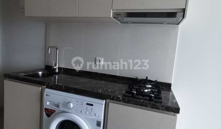Disewakan Apartemen Puri Mansion tipe studio semi furnish murah 2