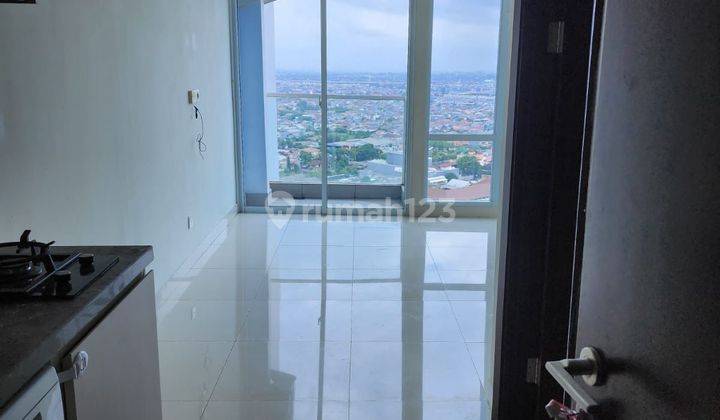 Dijual Rugi Apartemen Puri Mansion Tipe Studio Semi Furnish Murah 1