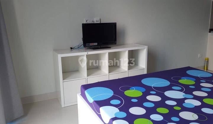 Disewakan Apartemen Puri Mansion Tipe Studio Furnish View Kolam 1