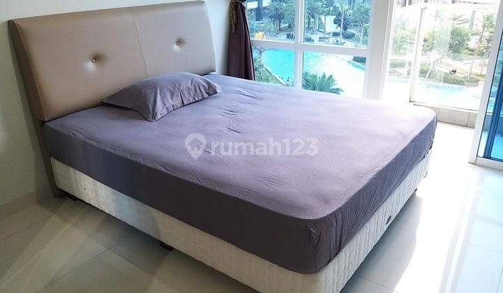 Disewakan apartemen puri mansion tipe studio furnish view kolam 1