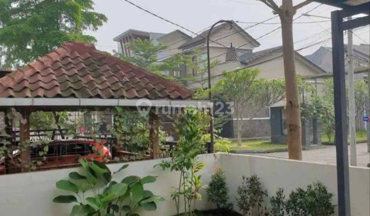 Rumah Modern Minimalis dengan Taman Asri di Kota Bali Residence 1