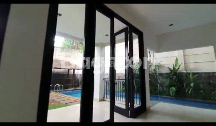 RUMAH 2 LANTAI DENGAN SWIMMING POOL BERHALAMAN LUAS DI KEMANG 2