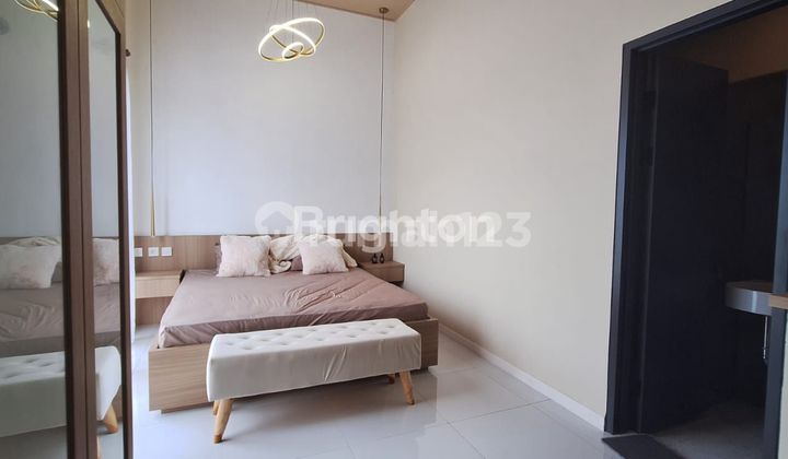 RUMAH MODERN DALAM CLUSTER DI UTARA HYATT 2