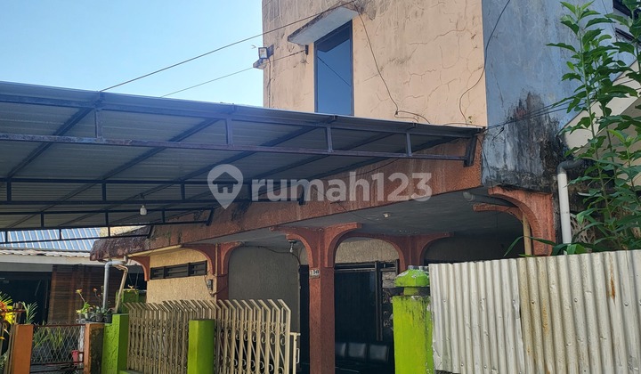 Two-Story House In The City Center