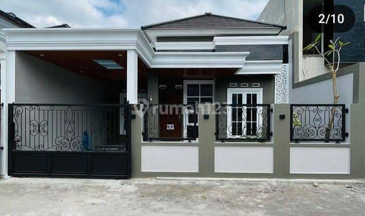 Rumah Cantik Bata Merah Pinggir Jalan Dilalui Angkot 1