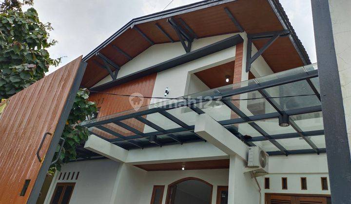 Kavling Polri Kayu Mas, Jakarta Timur - modern Tropis Kontemporer, High-End Material Quality  ( Rumah 2 Lantai Shm Bagus Utara ) 2