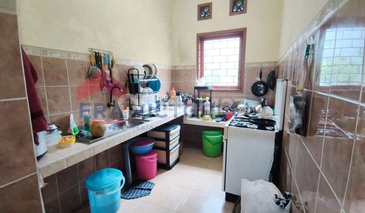 Exclusive Property in Batu City with a Residential and Investment Concept in One Location. Consists of a Main House, Pavilion, and an Active Boarding House Building in the Batu Area. 2