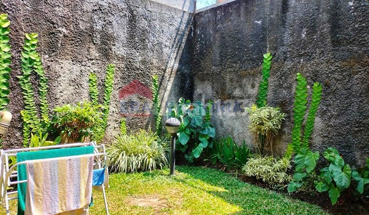 For Sale: Good Condition and Semi-Furnished House Near Toll Road and Airport in Sawojajar Area 2