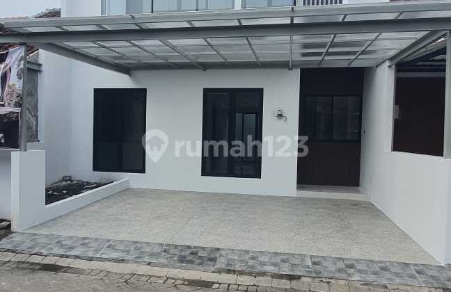 Gress Minimal House Citraland Bukit Palma in West Surabaya