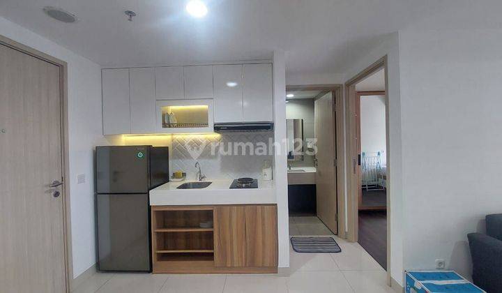 Apartemen Orange County Lippo Cikarang 2 Kamar Tidur Furnished Baru 1