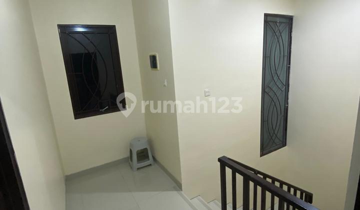 Disewakan Rumah Terawat lokasi Strategis Cluster Cosmo Estate Lippo Cikarang 2