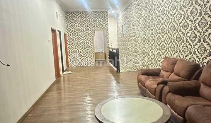 Semi-Furnished Wide House in Harapan Indah, Flood-Free