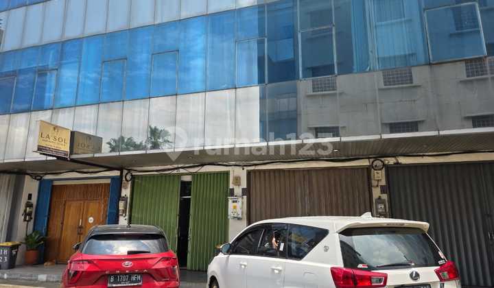 Shop House for Sale on Jalan Panjang Graha Arteri Mas, in front of Trans Jakarta Bus Stop  
SHM = 56 m2, HGB = 23 m2  
Land Area = 61 m2, Building Area = 308 m2  
4.5 floors + 1 Basement floor  
Width = 4.8 m - Length = 17 m  
Each floor has a Toilet  
2 Phone lines, Electricity = 4400 KVA  
Bore Well, 2 water tanks 2