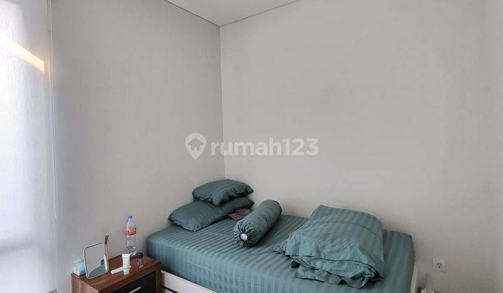 Rumah Unfurnished 2 Lantai Hadap Selatan di Graha Raya Sc14054 2