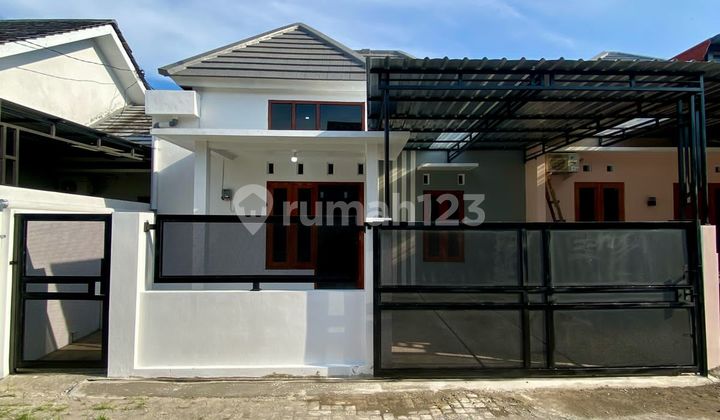 Exciting!!! New White Limasan Modern House in Griya Tombima Housing Near Giwangan Exciting!!! New White Limasan Modern House in Griya Tombima Housing Near Giwangan