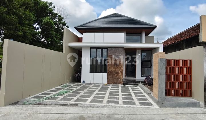 Special!!! Beautiful Modern Tropical House with Large Land, Rice Field View, Asphalt Roadside on Jalan Kaliurang Km 10, Near Gentan Market