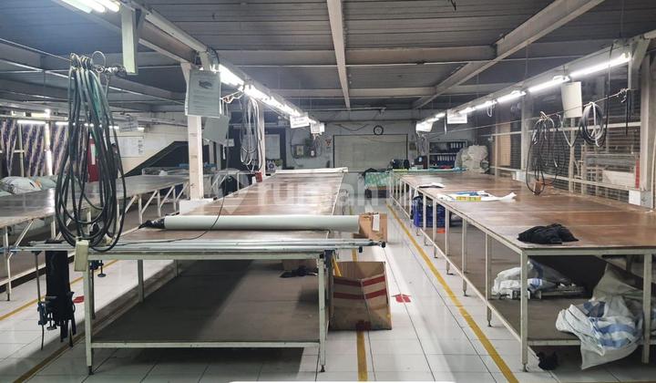 For Sale: Ex-Garment Factory Located in Jayanti, Tangerang Regency. Land Area: 5,675 m², Building Area: Approximately 4,000 m², Electricity: 250 Kva, SHM Certificate: 1 Book Page, Concrete Floor. Selling Point: 900 M Access for 40 Ft Container to Pantura Main Road. Price: Rp 22 Billion Negotiable.