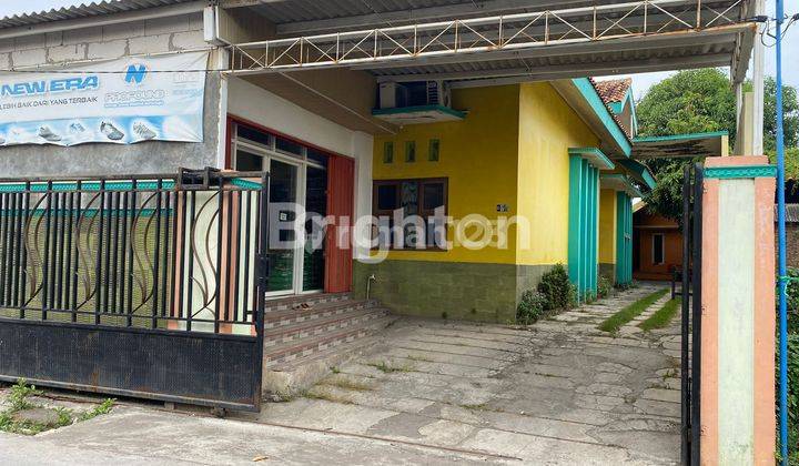 RUMAH DENGAN TOKO ,GUDANG DAN PAVILLIUN 1