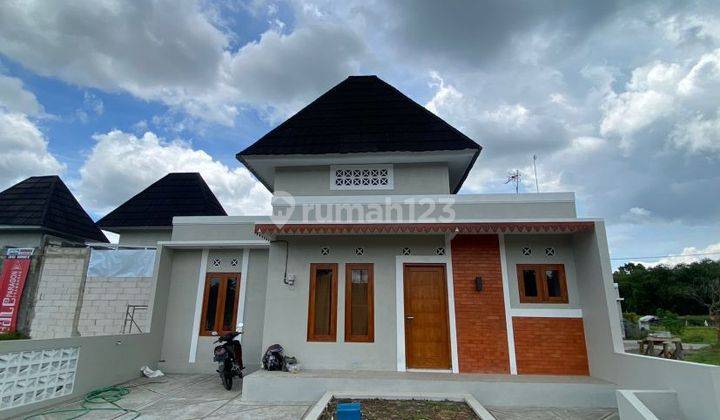 RUMAH DALAM CLUSTER, 200 METER DARI JL. RAYA JOGJA SOLO 1