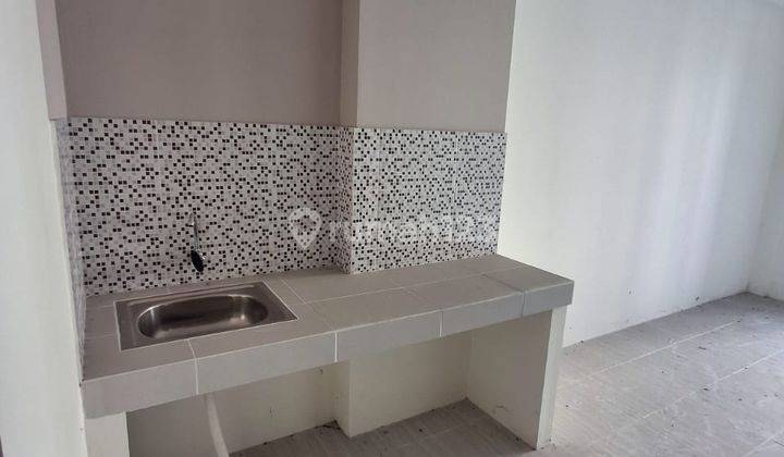 Dijual Apartemen Puncak Dharmahusada 2 BR Unfurnished Murah 1