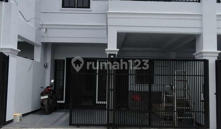 A Beautiful New House with a Rooftop in Pondok Kelapa, Jakarta. A Beautiful New House with a Rooftop in Pondok Kelapa, Jakarta.