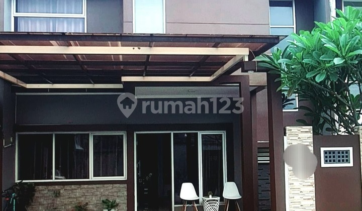 Rumah Siap Huni dalam Cluster Taman Apel Mustika Jaya Bekasi