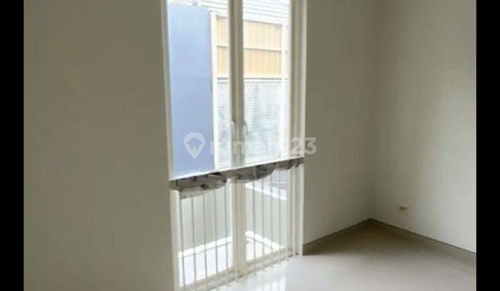 kamar tidur rumah the greenlake citraland surabaya