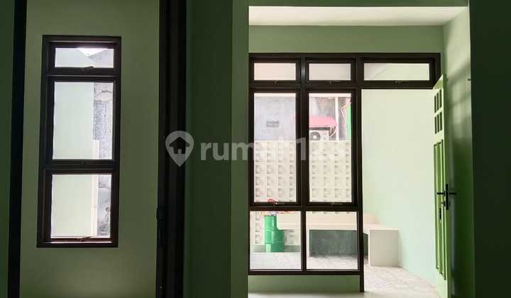 Rumah 2 Lantai dengan Suasana Asri di Villa Mutiara Bogor 1. 015 2