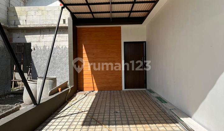 Rumah modern scandinavian pinggir jalan utama 2