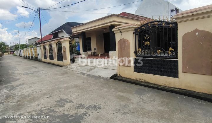 RUMAH 1 LANTAI DENGAN PEKARANGAN LUAS, RAMA KASIH , BAMBANG UTOYO, PALEMBANG 1