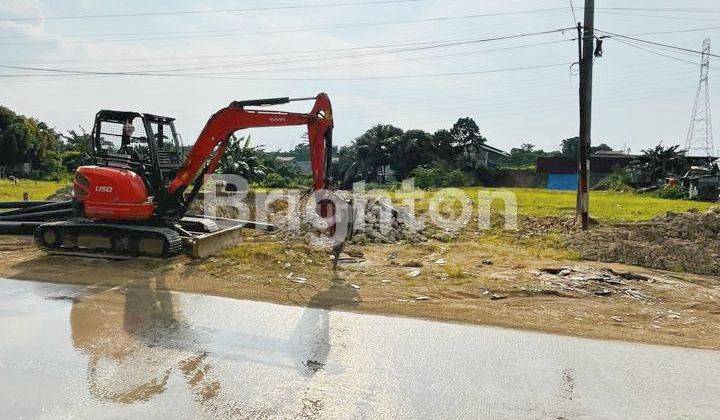 TANAH STRATEGIS DI PINGGIR JALAN, DEKAT SIMPANG 4 JALAN POROS  1