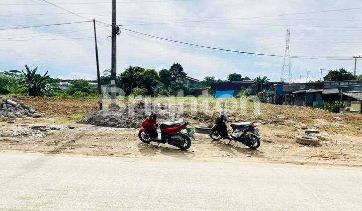 TANAH STRATEGIS DI PINGGIR JALAN, DEKAT SIMPANG 4 JALAN POROS  2