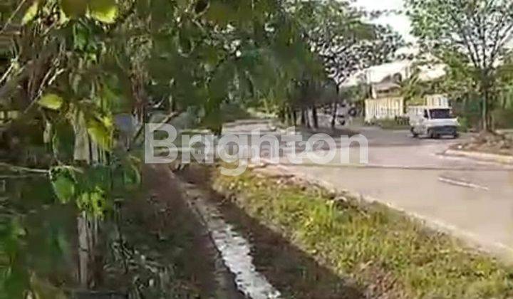 RUMAH DENGAN HALAMAN LUAS D PINGGIR JALAN RINGROAD  2