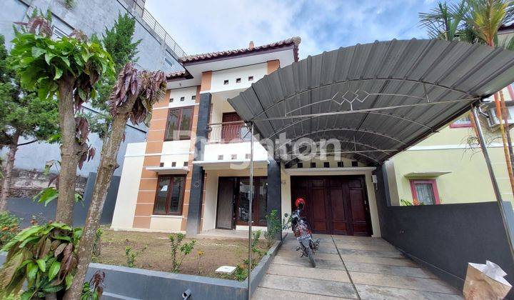 kan rumah 2 lantai di Perumahan Grand Mahakam 1