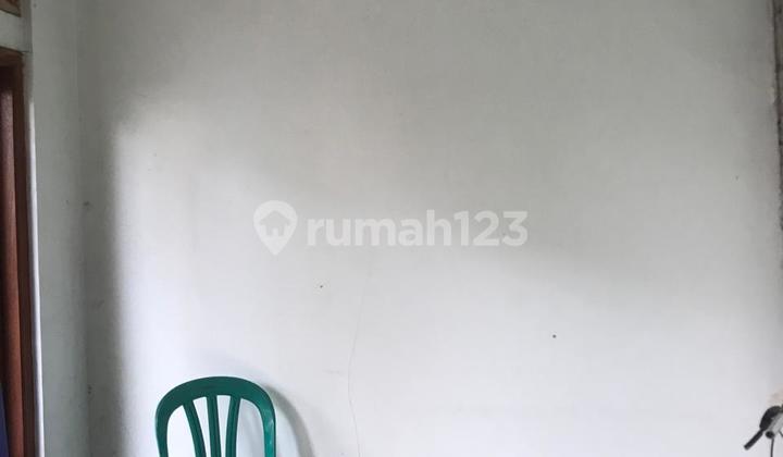 For sale, move-in ready house in Duta Harapan Telaga Mas, 1.5 floors, CCTV, guaranteed security, one gate, flood-free.